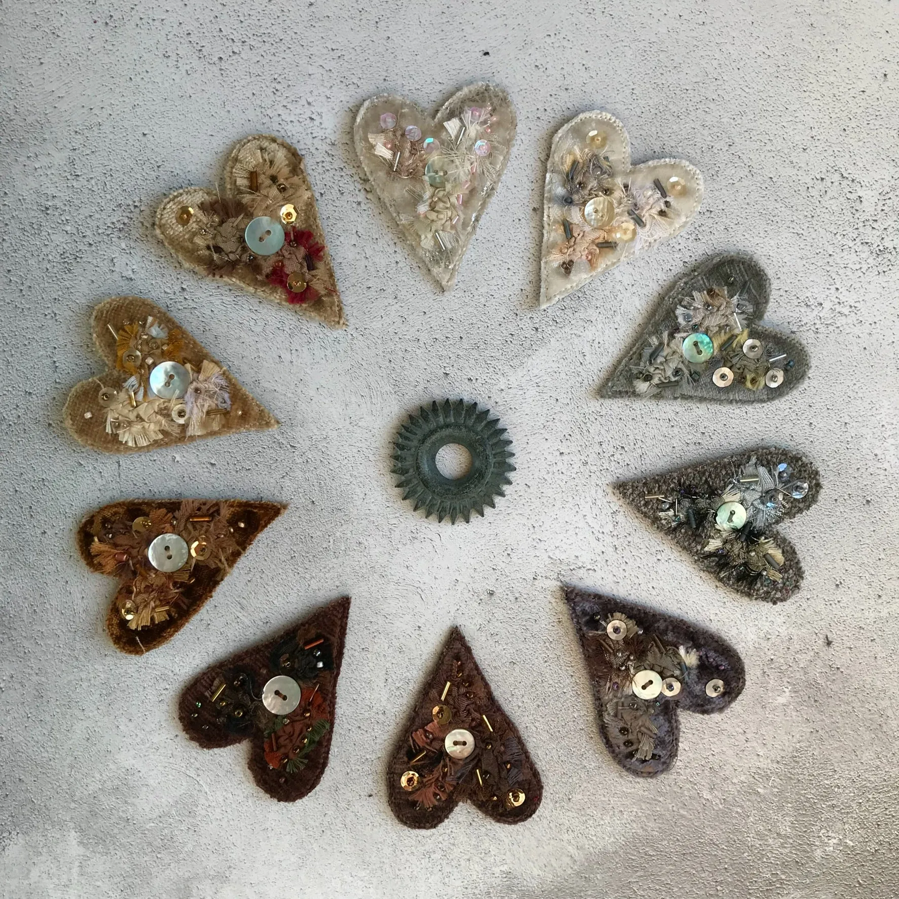 Fabric heart brooches in neutrals